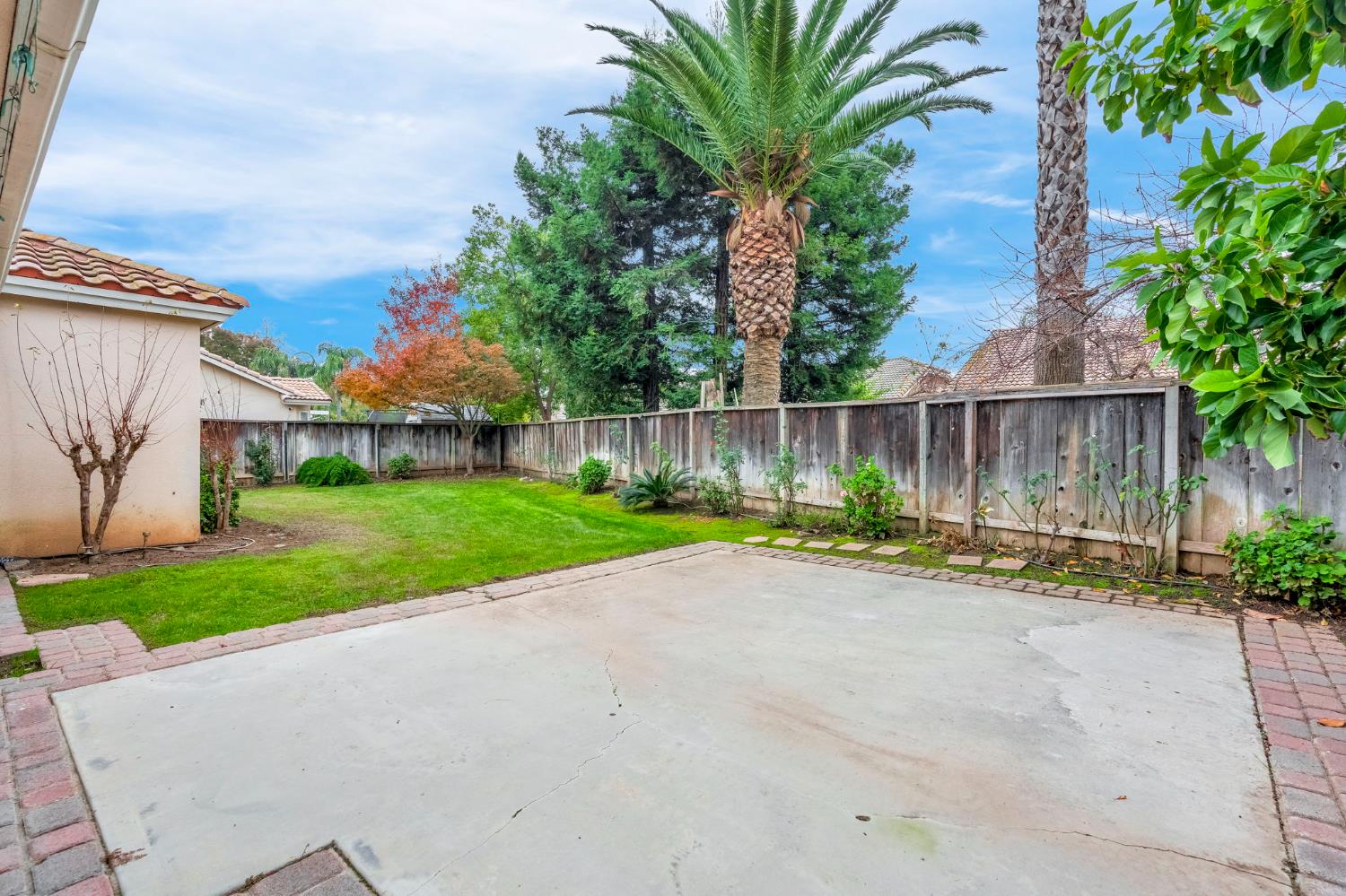 3410 Doubletree Way Madera, CA 93637 - Photo 32 of 34 a view of a house with a yard and a garden