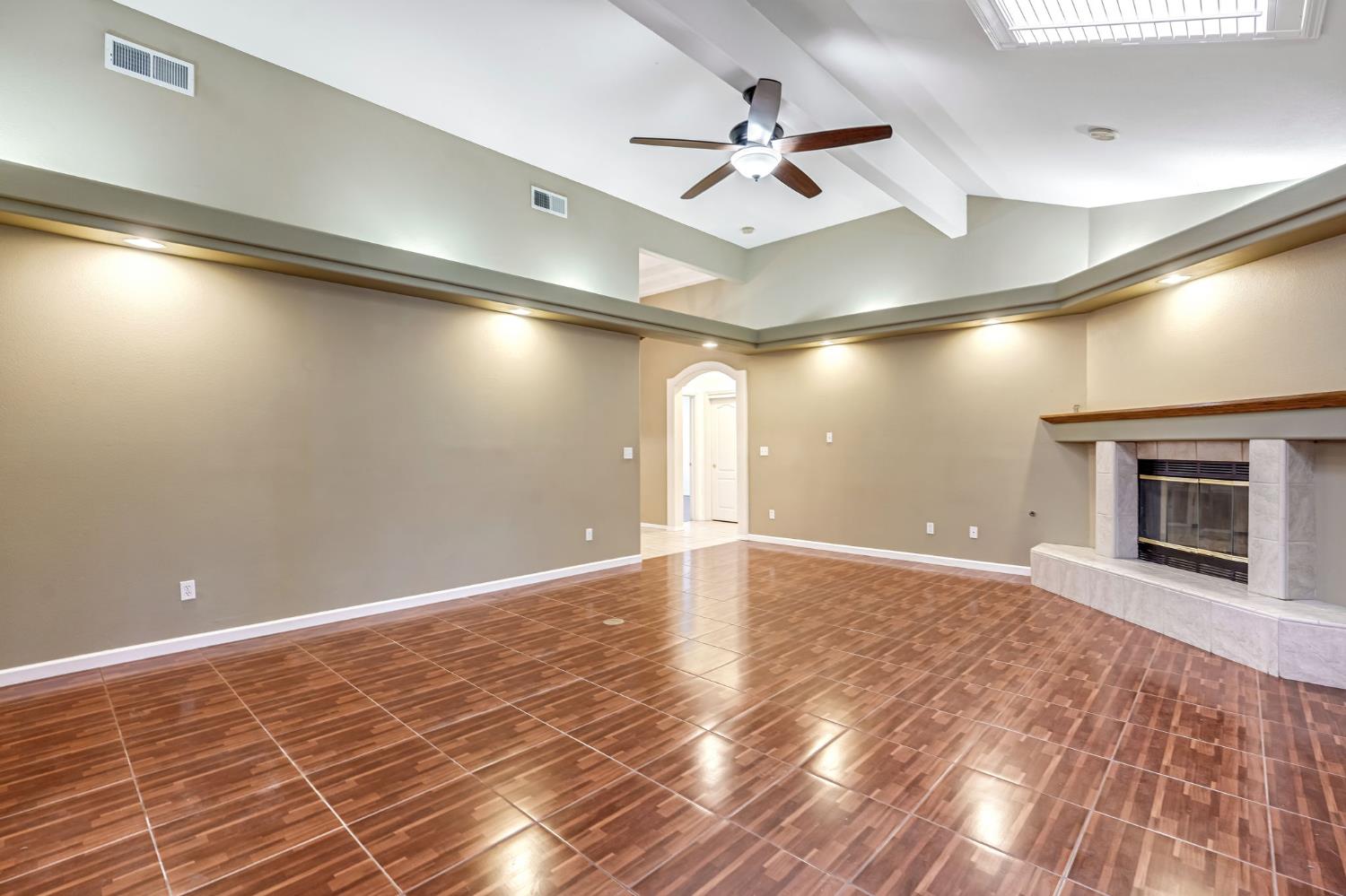 3410 Doubletree Way Madera, CA 93637 - Photo 8 of 34 a view of an empty room with a chandelier