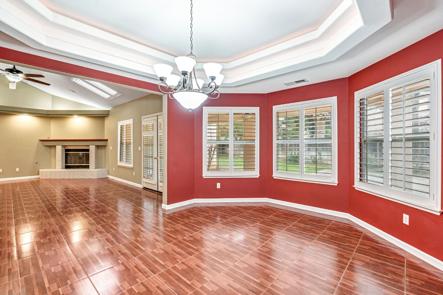 3410 Doubletree Way Madera, CA 93637 - Photo 10 of 34 a view of livingroom with window ceiling fan and kitchen area