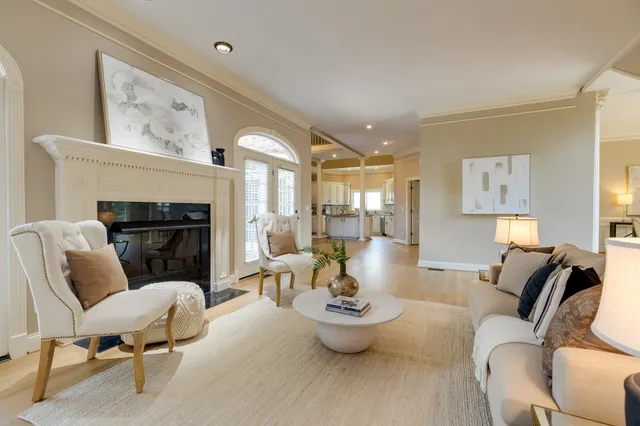 a kitchen with granite countertop a sink appliances cabinets and a counter top space