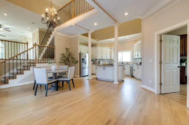 a kitchen with stainless steel appliances granite countertop a sink and cabinets