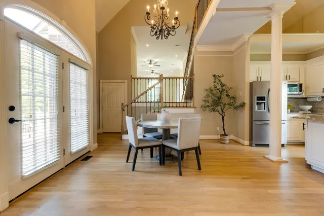a view of living room filled with furniture and window