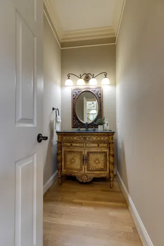 a bathroom with a sink and mirror