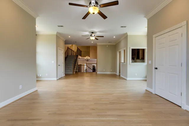 a bathroom with a bath tub with a shower