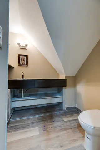 an aerial view of a house with a garden