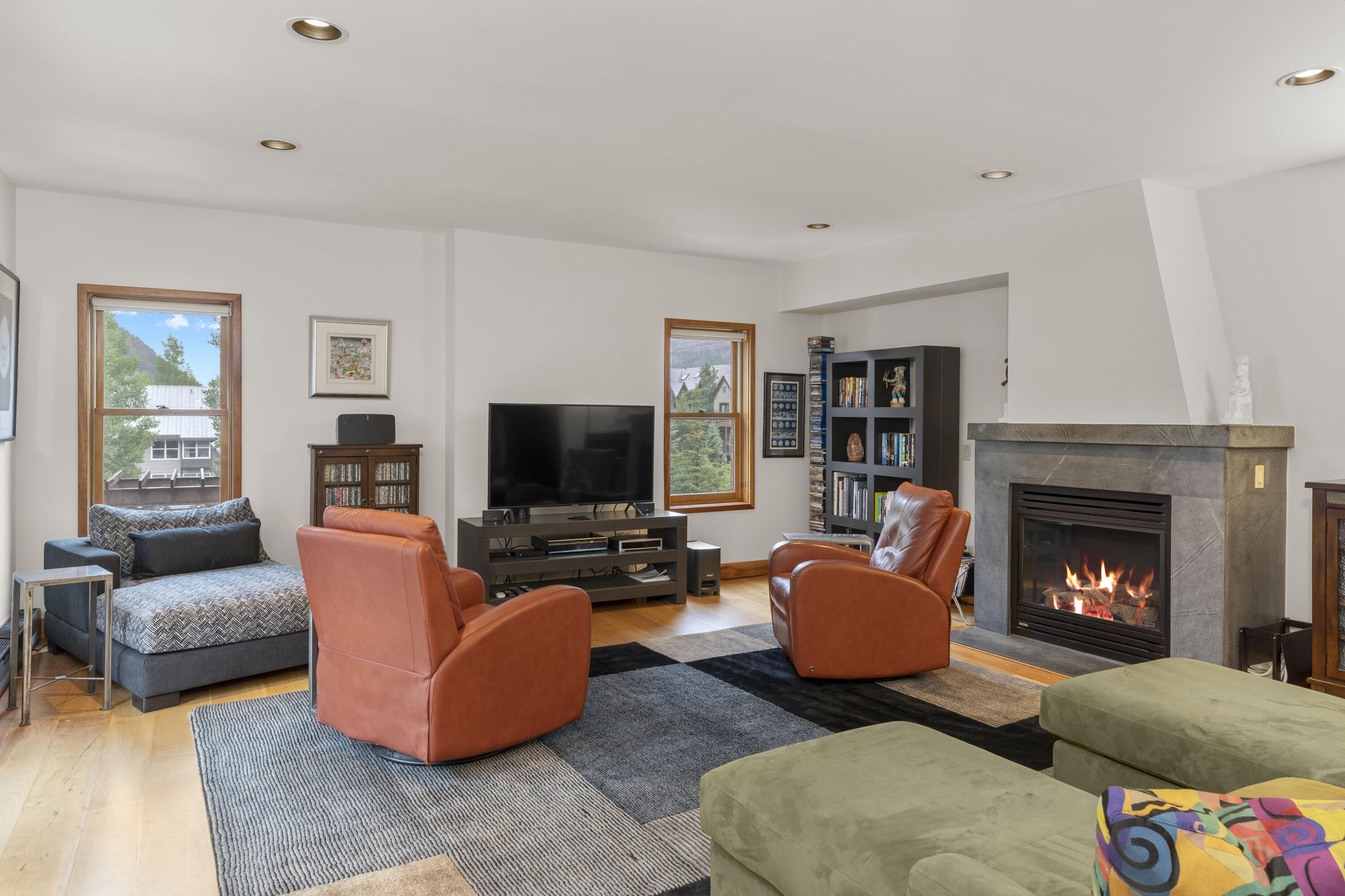 368 South Davis Street, Unit A7 Telluride, CO 81435 - Photo 2 of 14 a living room with furniture and a fireplace