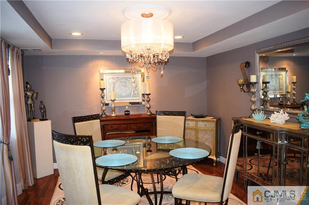 11 Rieder Road Spotswood, NJ 08884 - Photo 3 of 25 a view of a dining room with furniture and chandelier