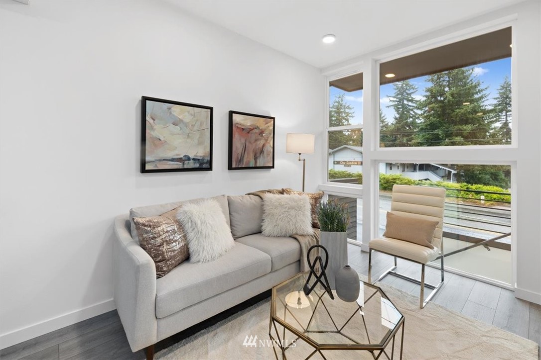 1271 North 145th Street Seattle, WA 98133 - Photo 15 of 32 a living room with furniture and a large window