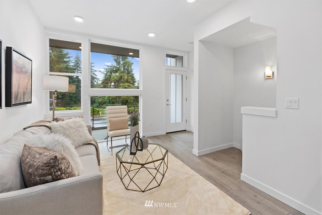 1271 North 145th Street Seattle, WA 98133 - Photo 16 of 32 a living room with furniture and a large window