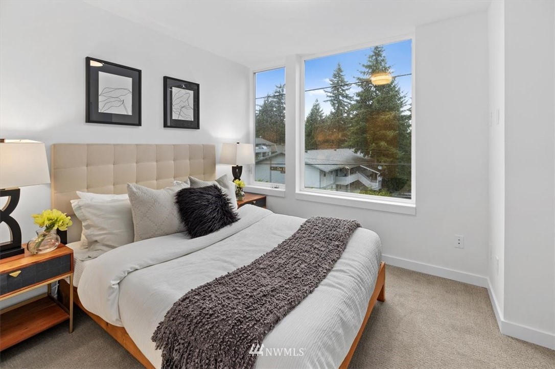 1271 North 145th Street Seattle, WA 98133 - Photo 20 of 32 a bedroom with a bed and a window