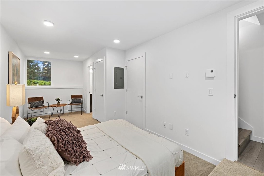1271 North 145th Street Seattle, WA 98133 - Photo 7 of 32 a bedroom with a bed and furniture