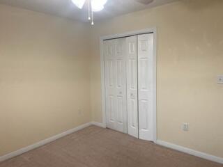 543 Tikell Drive Crestview, FL 32536 - Photo 17 of 27 an empty room with closet area