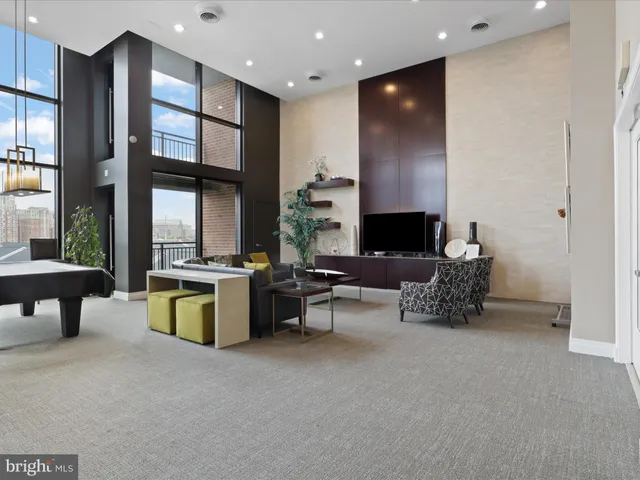 a view of kitchen and dining area with a sink