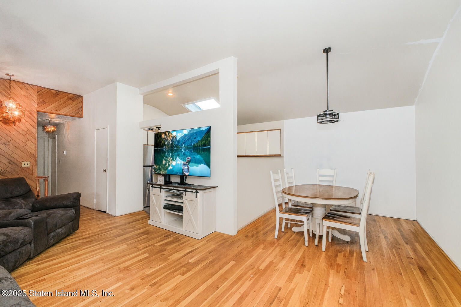 154 Merrill Avenue Staten Island, NY 10314 - Photo 10 of 21 a bedroom with a bed and a chair