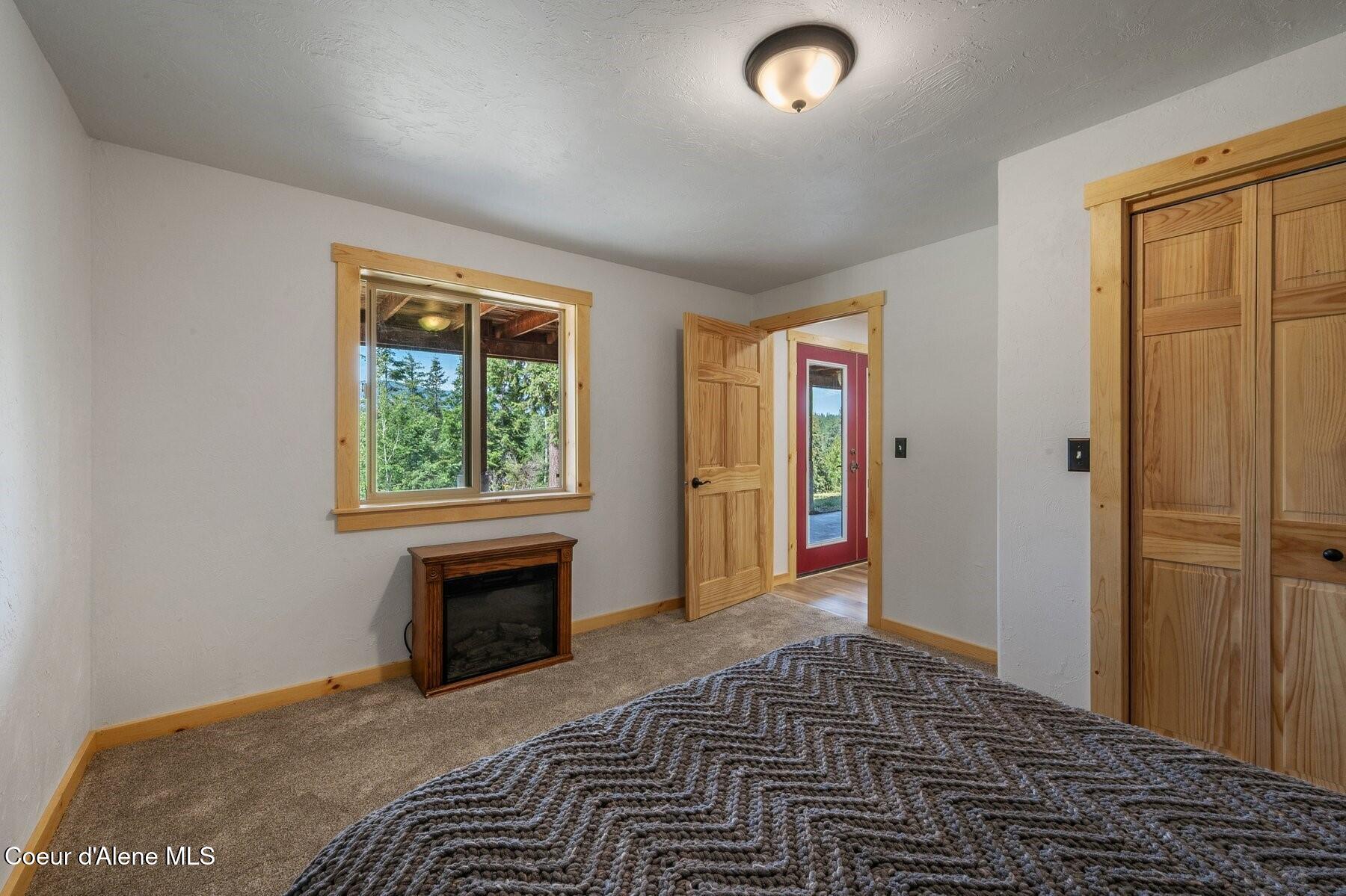 124 Brown Creek Road Naples, ID 83847 - Photo 21 of 65 Lower Level Bedroom