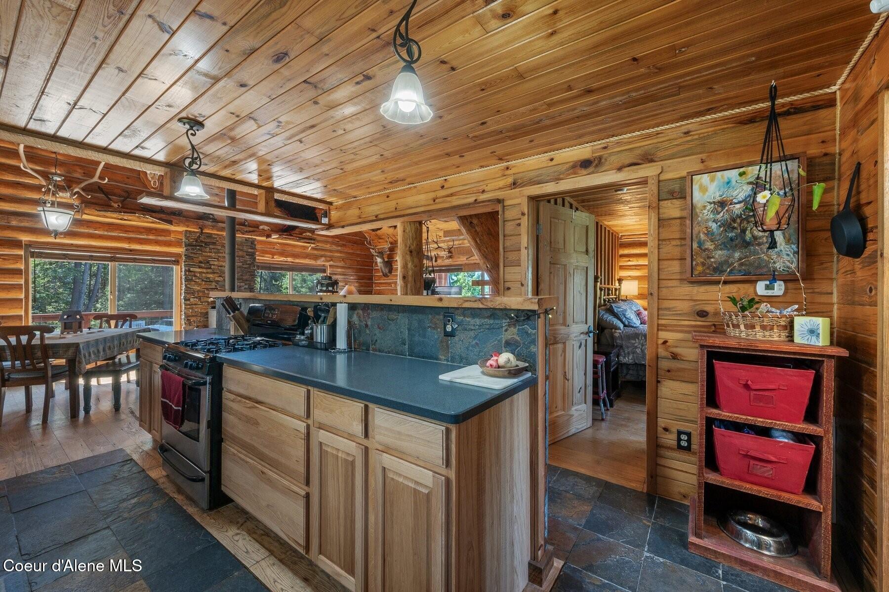 124 Brown Creek Road Naples, ID 83847 - Photo 7 of 65 Kitchen and Main Level Bedroom