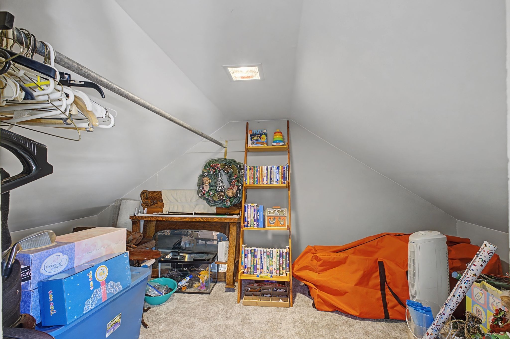 1231 Abiff Road Bon Aqua, TN 37025 - Photo 29 of 60 a bedroom with a bed and a tv in it