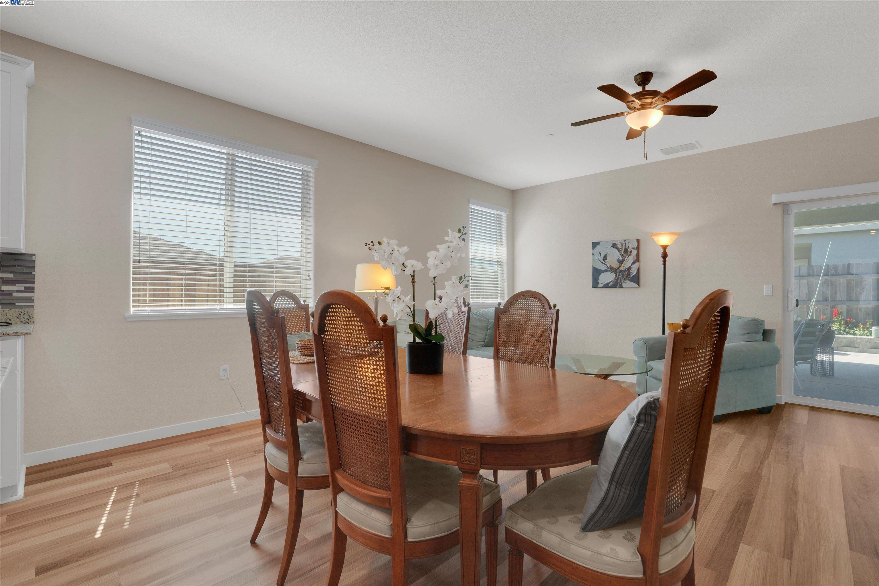 2211 Lavender Place Rio Vista, CA 94571 - Photo 17 of 36 a view of a dining room with furniture and wooden floor