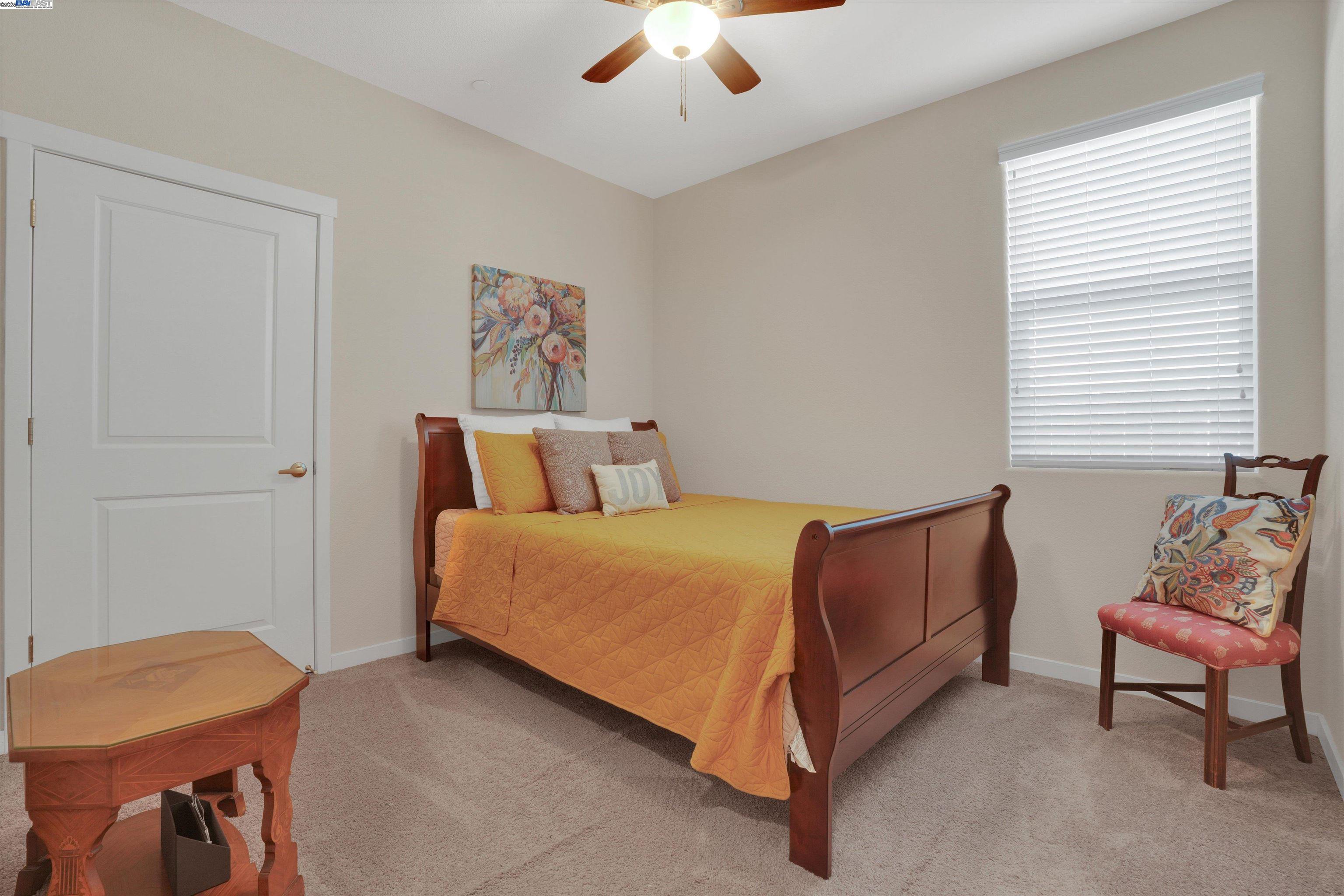 2211 Lavender Place Rio Vista, CA 94571 - Photo 22 of 36 a bedroom with a bed and chair