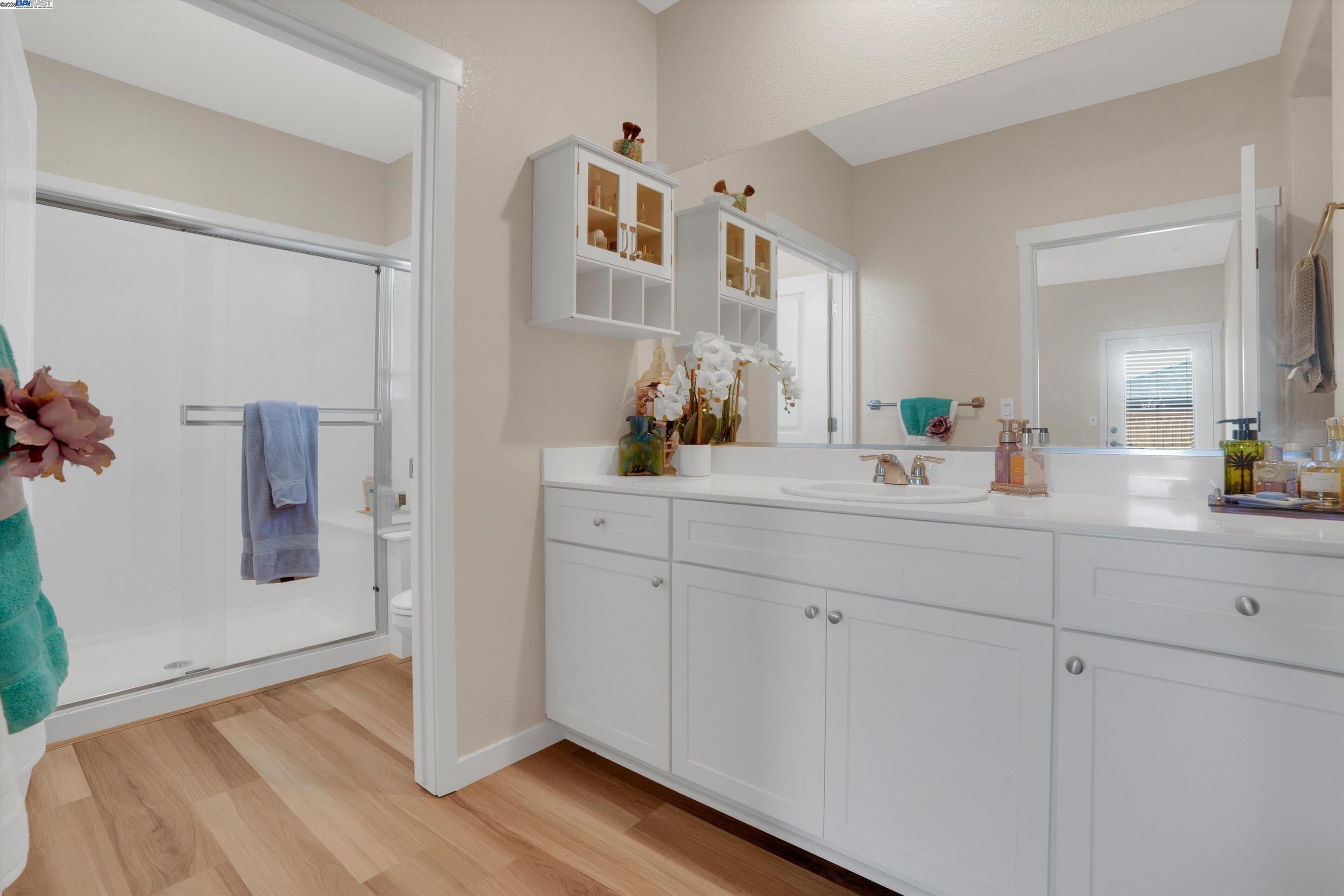 2211 Lavender Place Rio Vista, CA 94571 - Photo 26 of 36 a spacious bathroom with a double vanity sink a mirror and shower