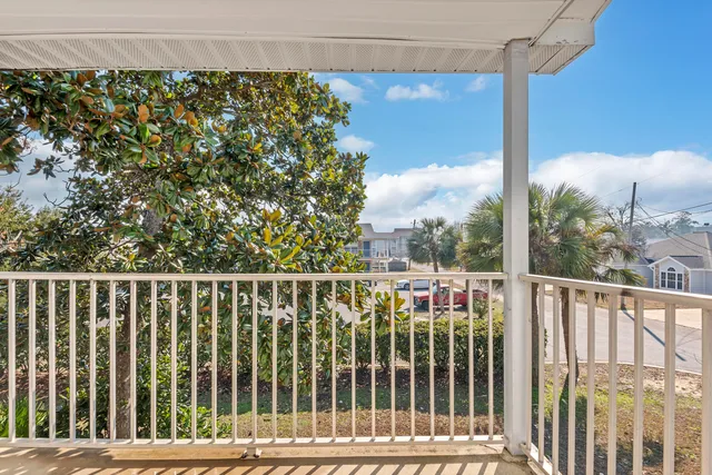 a view of a balcony with city view