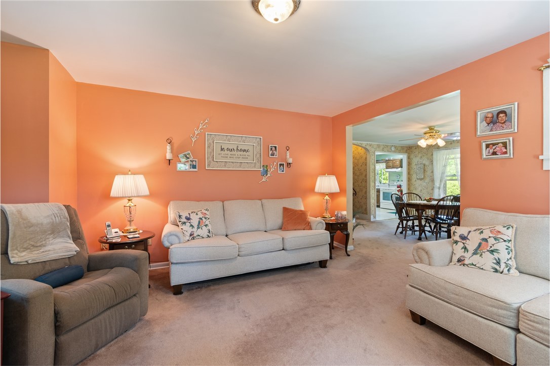 11805 Wilson Road Butler, NY 14590 - Photo 21 of 48 THE LIVING ROOM HAS RELAXING VIEWS OF THE COUNTRY