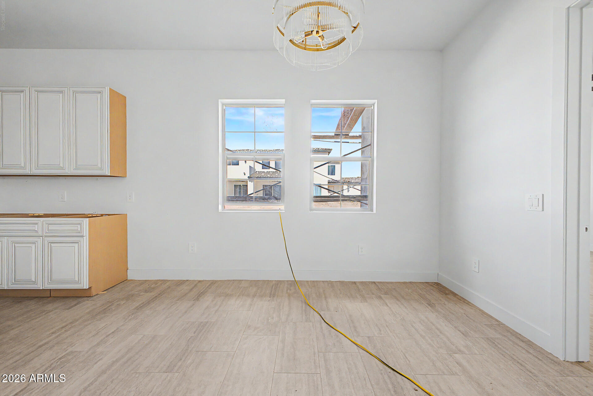 18815 West Arlington Road Buckeye, AZ 85326 - Photo 9 of 56 an empty room with a window