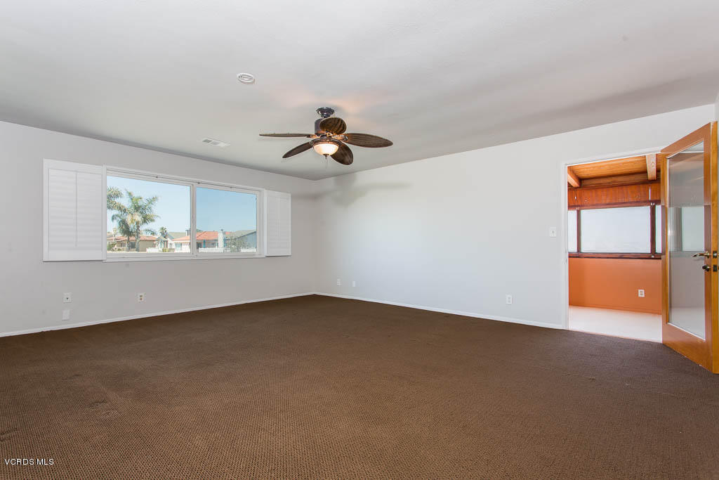 5051 Island View Street Oxnard, CA 93035 - Photo 22 of 38 a view of an empty room with a window