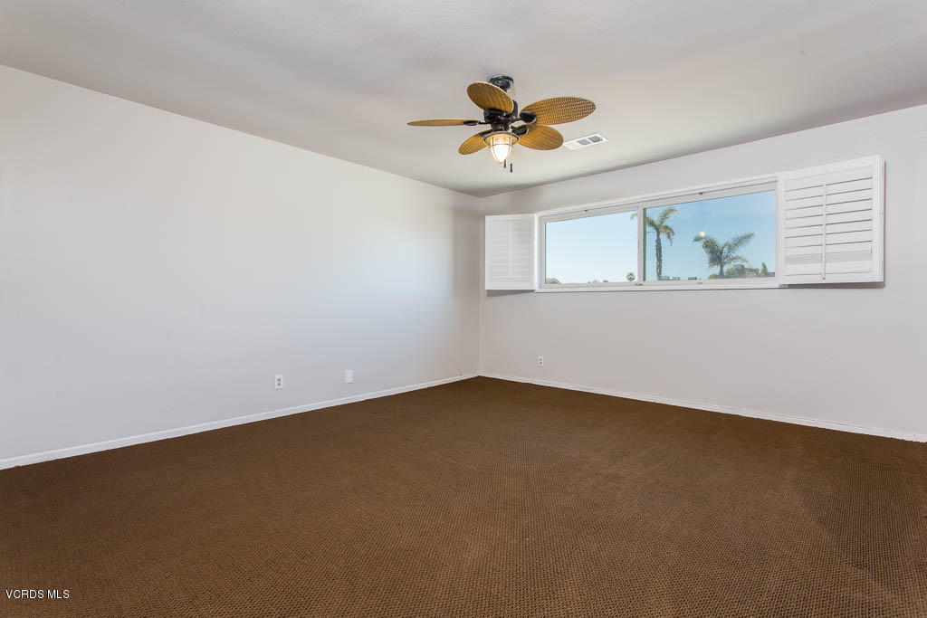 5051 Island View Street Oxnard, CA 93035 - Photo 27 of 38 a view of an empty room with a window
