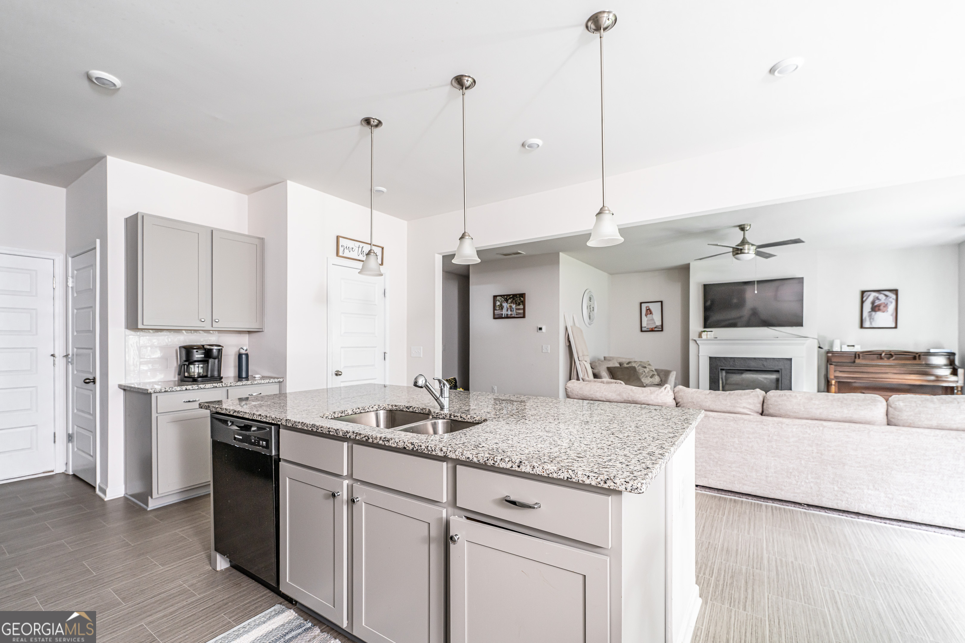 84 Royal Oak Drive Northeast Rome, GA 30165 - Photo 8 of 27 a kitchen with stainless steel appliances granite countertop a sink a stove and a refrigerator