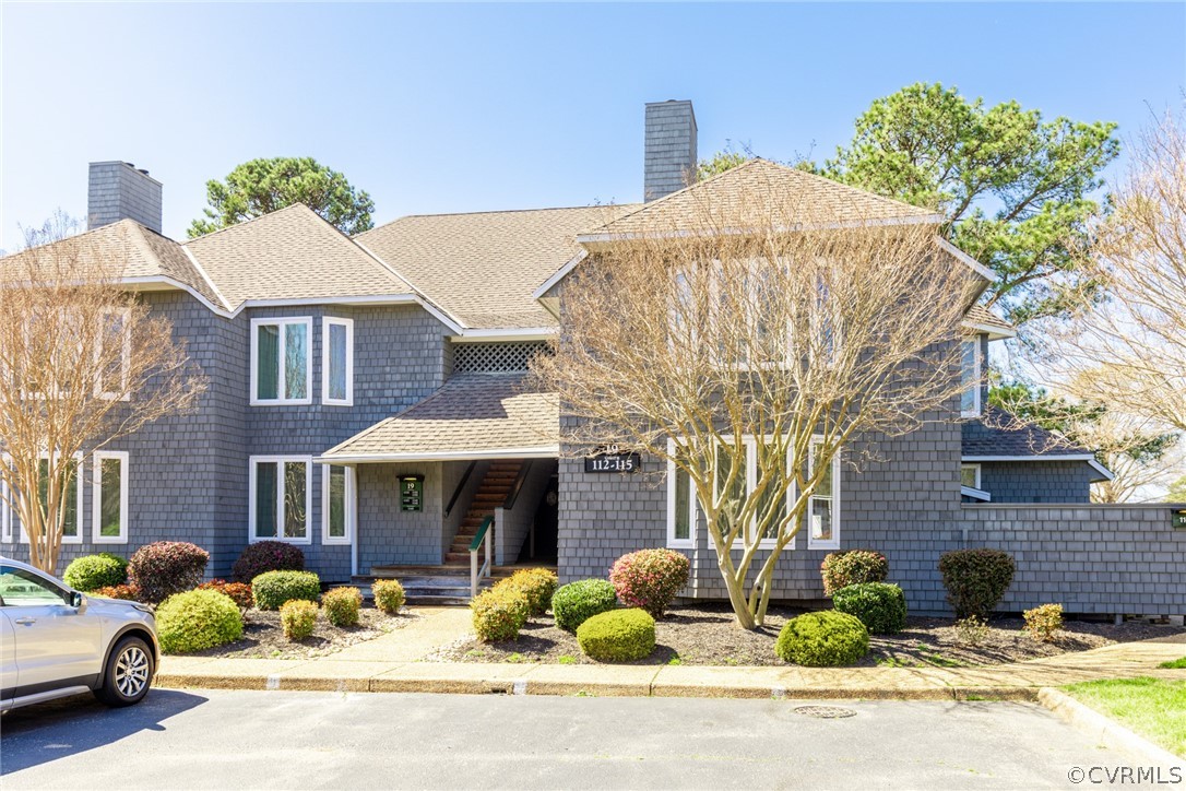 115 Pelhams Ordinary Williamsburg, VA 23185 - Photo 1 of 31 a front view of a house with yard and seating area