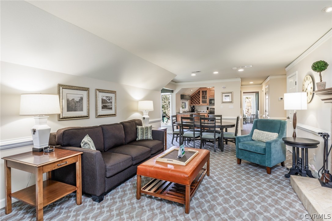 115 Pelhams Ordinary Williamsburg, VA 23185 - Photo 13 of 31 a living room with furniture and a wooden floor