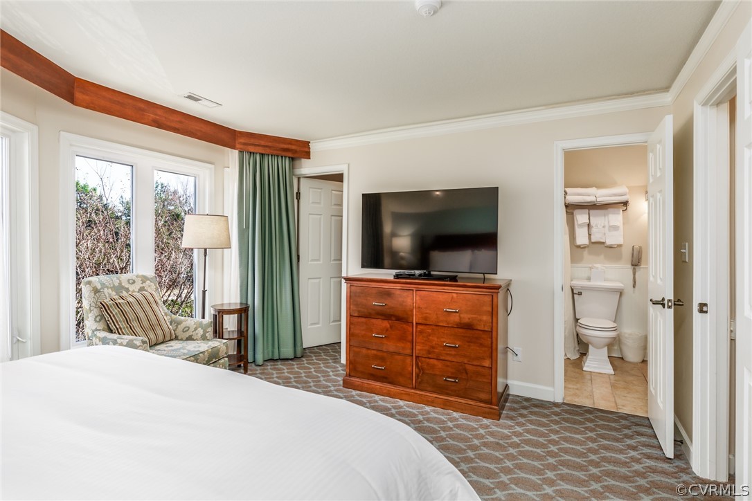 115 Pelhams Ordinary Williamsburg, VA 23185 - Photo 15 of 31 a bedroom with a bed and a television
