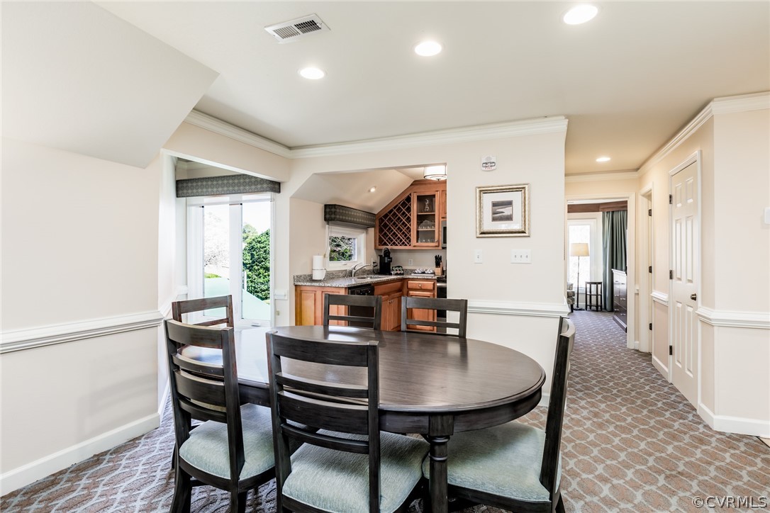 115 Pelhams Ordinary Williamsburg, VA 23185 - Photo 6 of 31 a view of a dining room with furniture and wooden floor