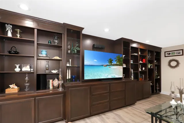 a kitchen with stainless steel appliances cabinets and a counter top space