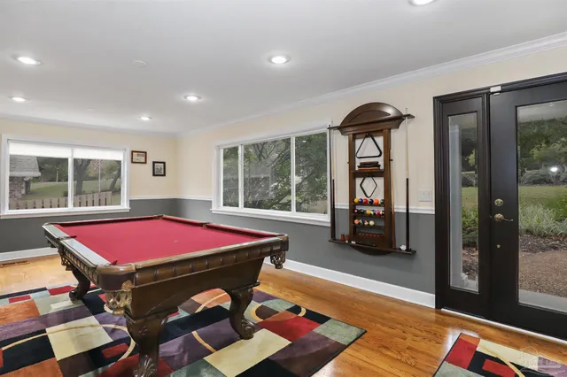 a patio with a table and chairs