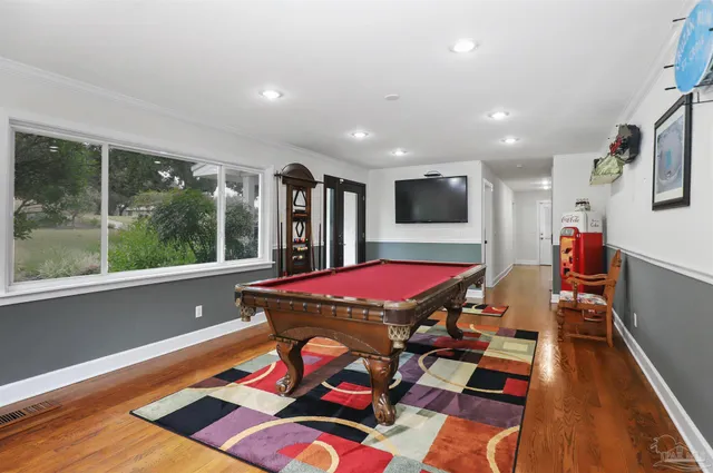 a outdoor space with furniture and wooden floor