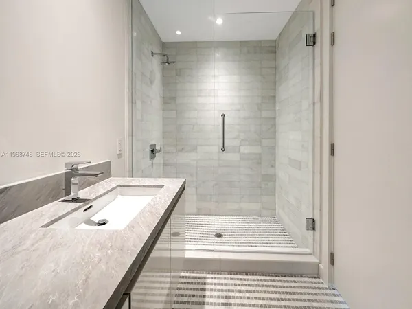 a bathroom with a sink toilet and vanity