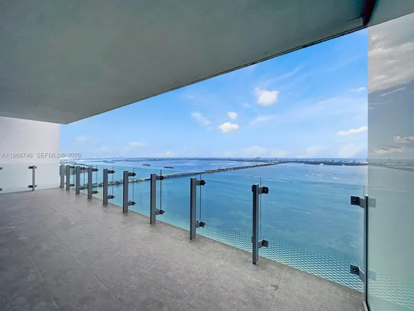 a view of an ocean and building