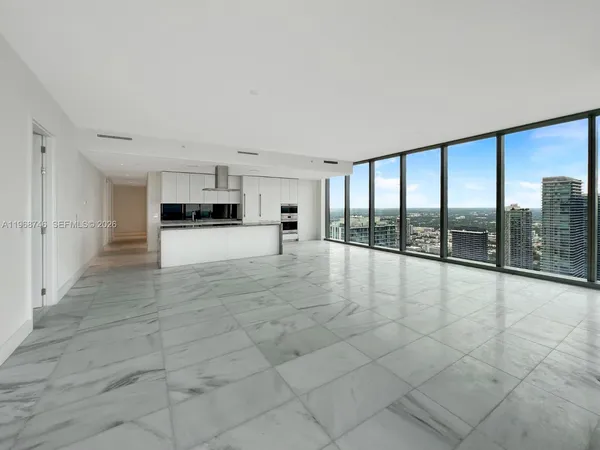 a kitchen with a large counter top