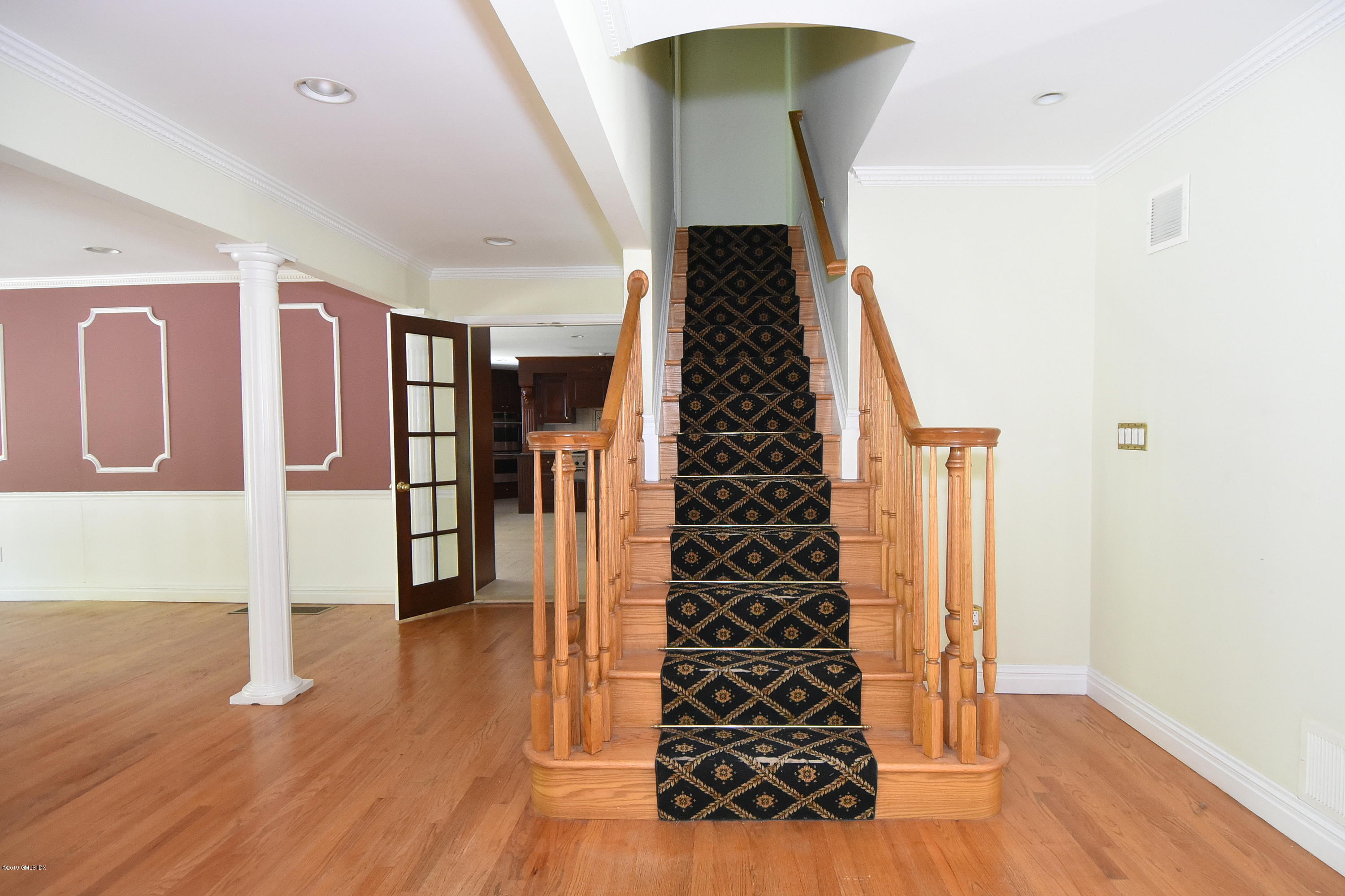 1 Tinker Lane Greenwich, CT 06830 - Photo 17 of 30 a view of an entryway with wooden floor