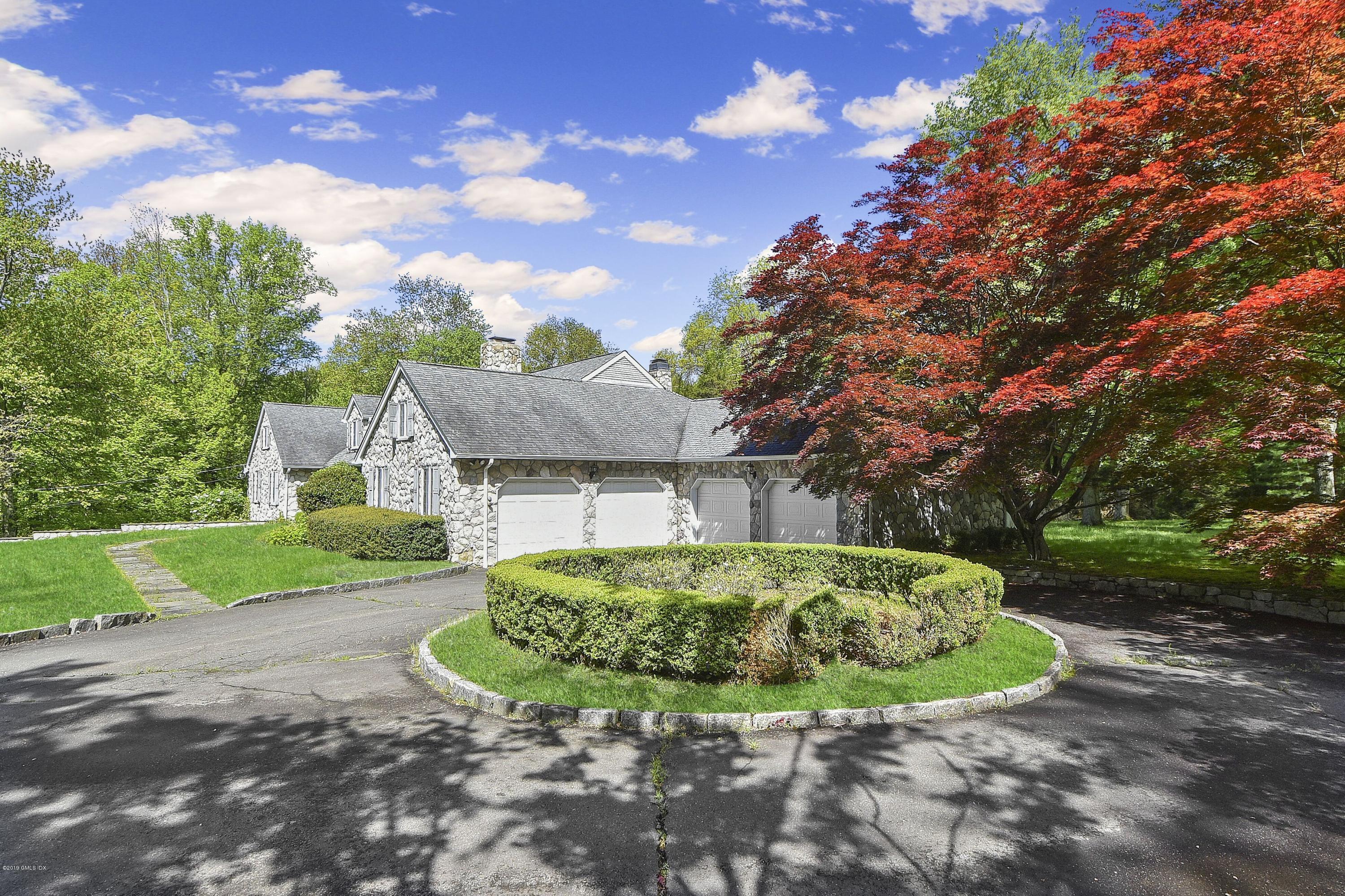 1 Tinker Lane Greenwich, CT 06830 - Photo 28 of 30 a view of a house with a yard