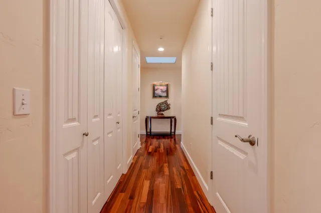 a bed room with a bed and a chair