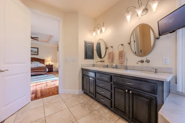 a bathroom with a toilet and shower