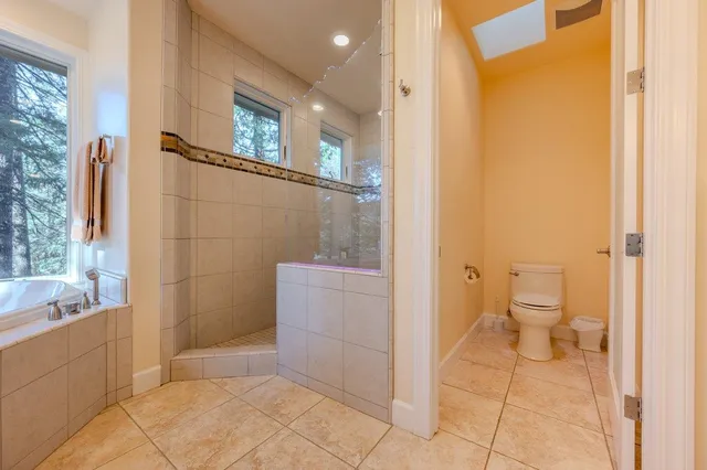 a view of a hallway with washer and dryer