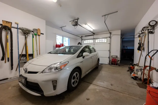 a view of entrance of house with trees