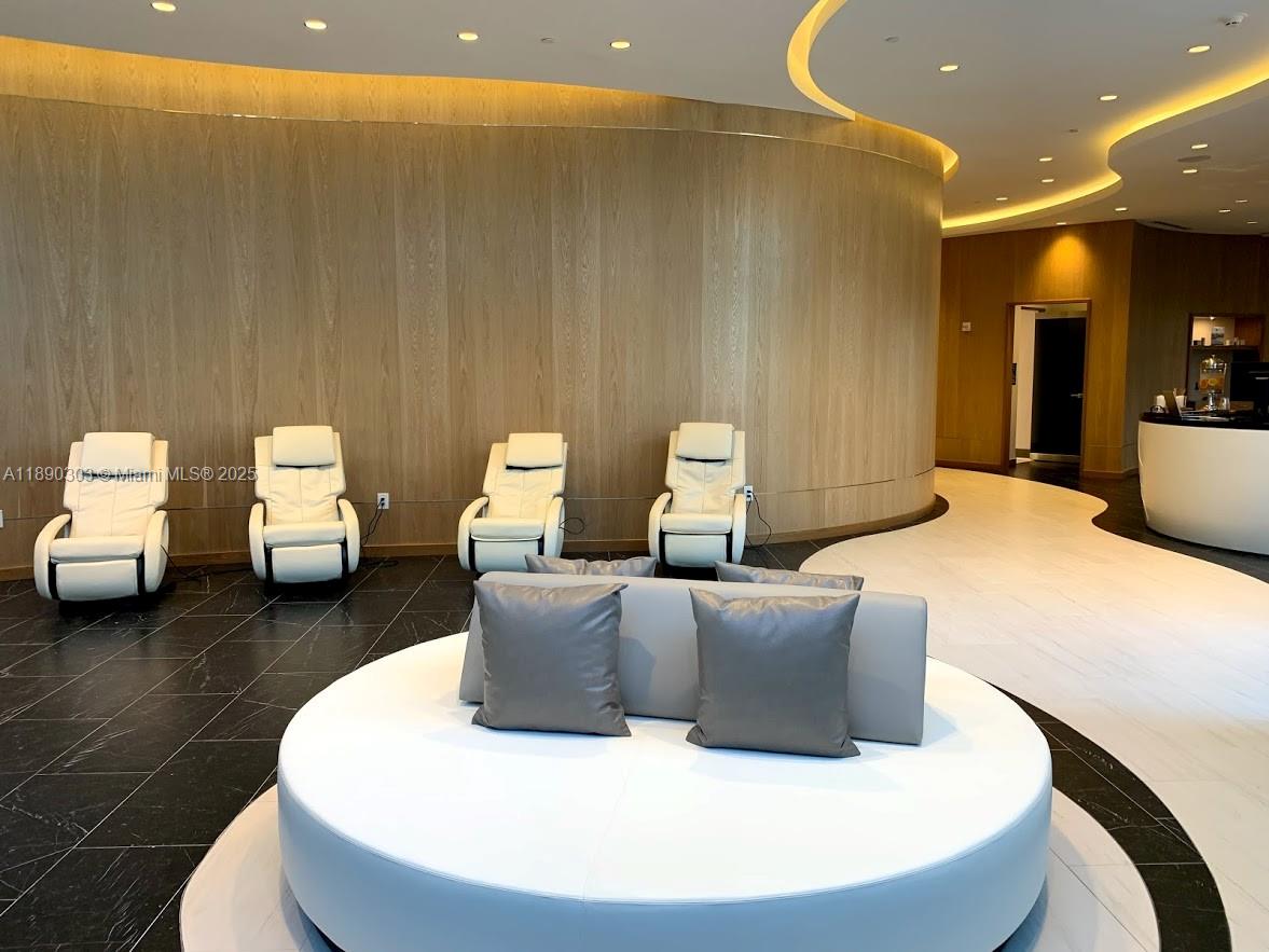 851 Northeast 1st Avenue, Unit 2702 Miami, FL 33132 - Photo 41 of 48 a living room with furniture