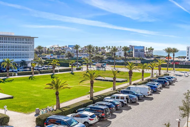 a view of a swimming pool with a lounge chairs