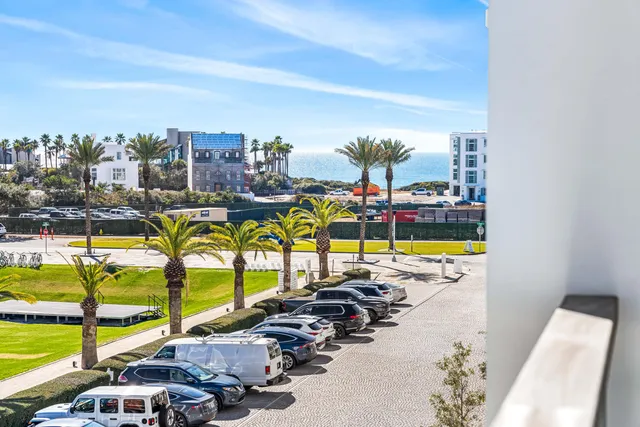 a bathroom with a toilet a sink and a shower