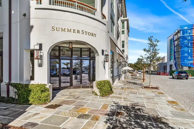 a view of a building with sitting area
